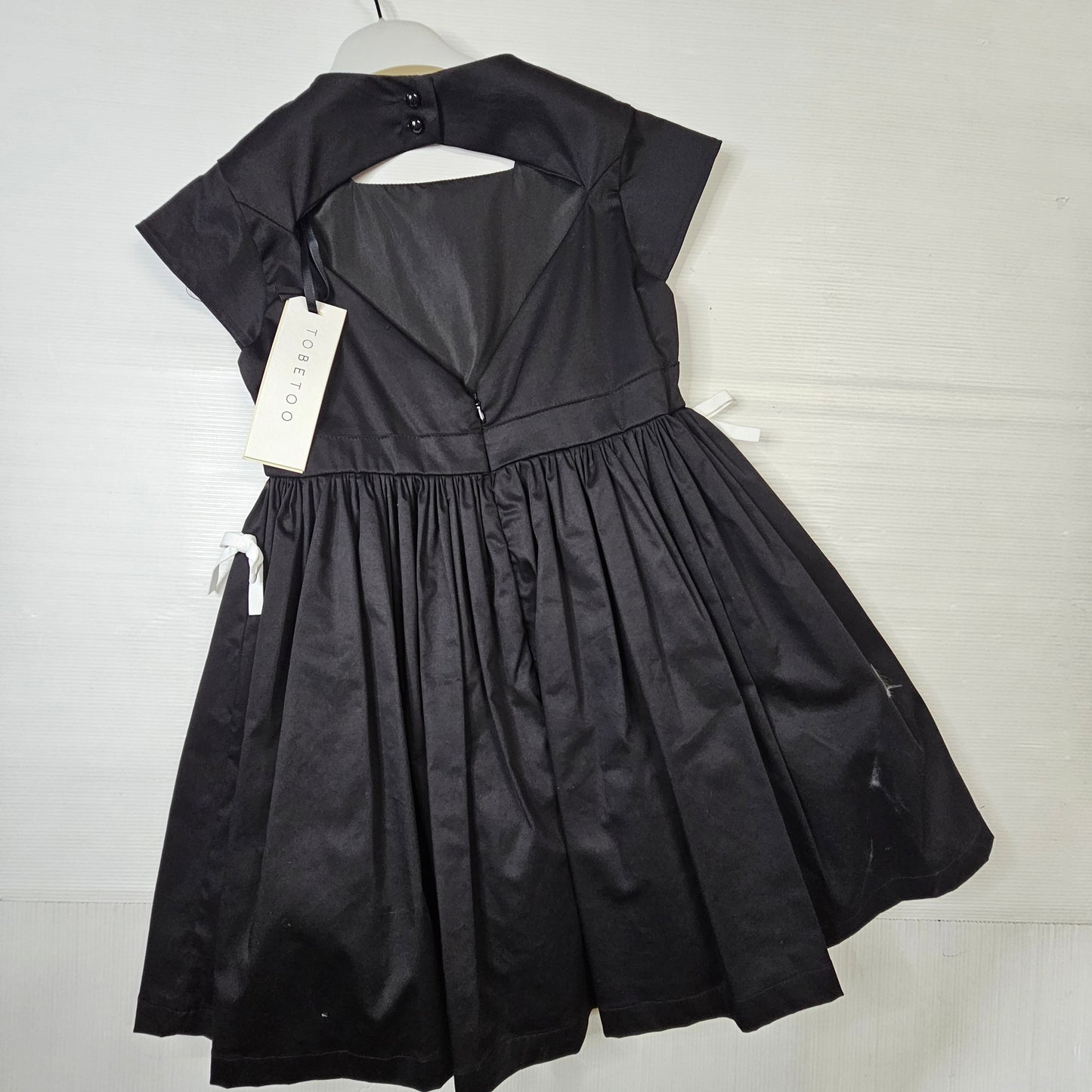 Vestito nero con fiocchi bambina 305ATBS25