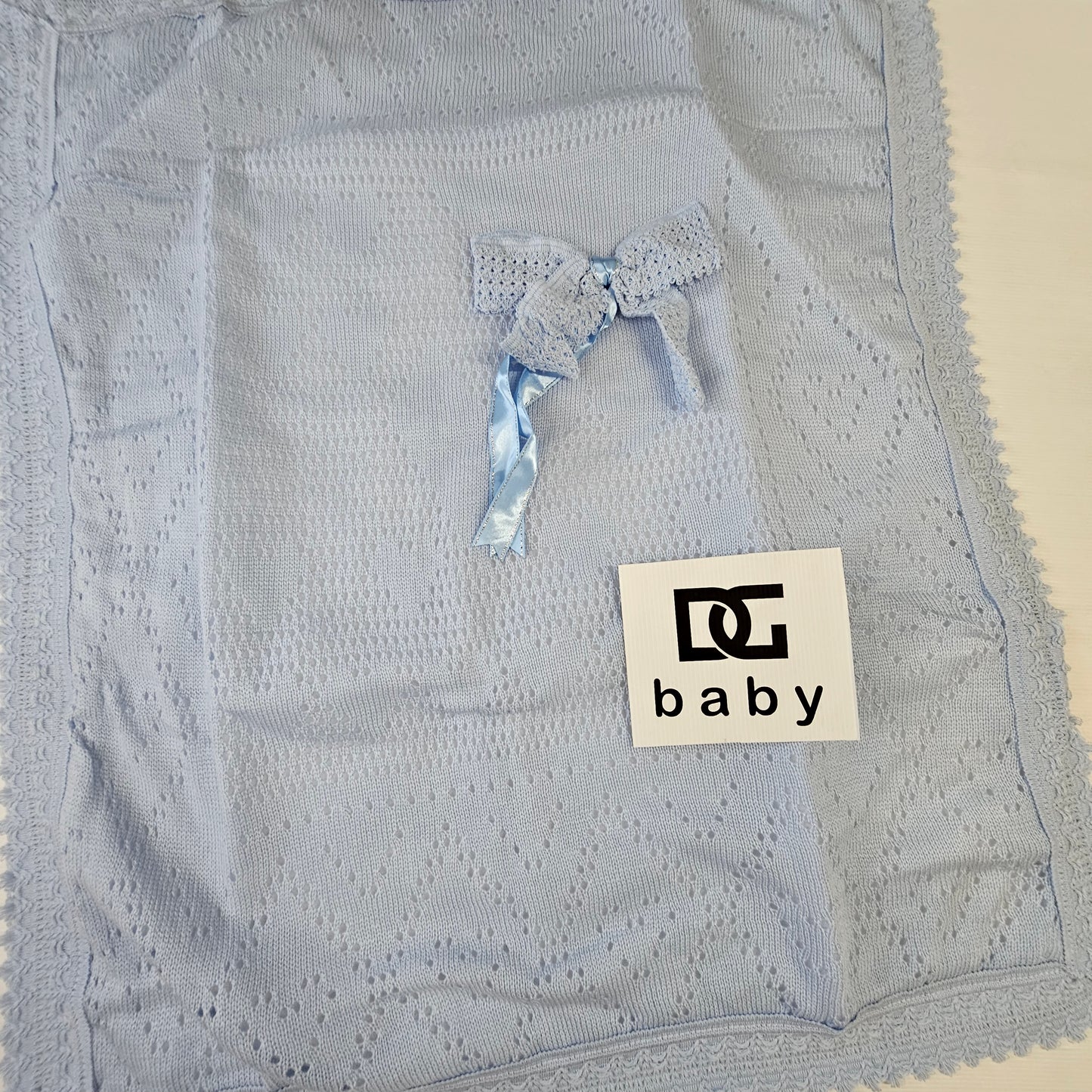 copertina fiocco in lana