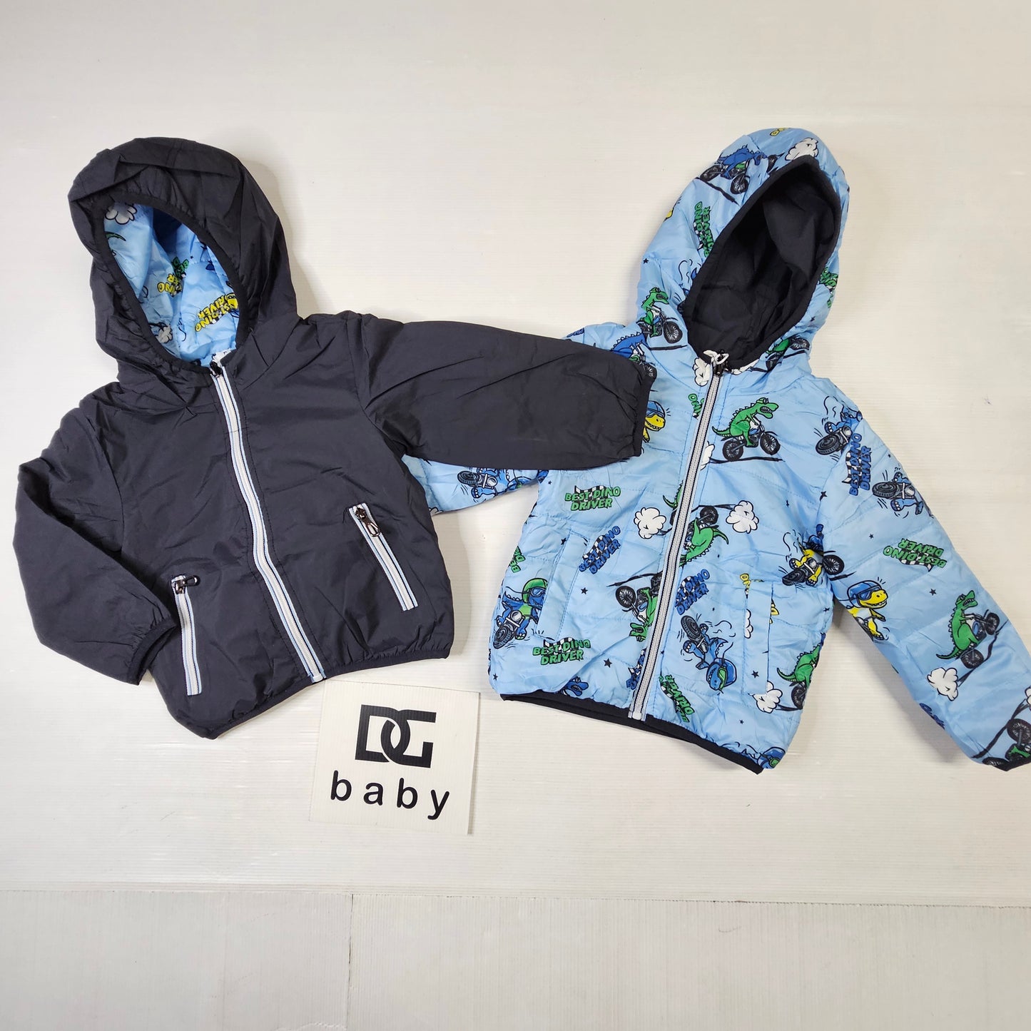 Giubbino bambino reversibile con cappuccio stampa dinosauri