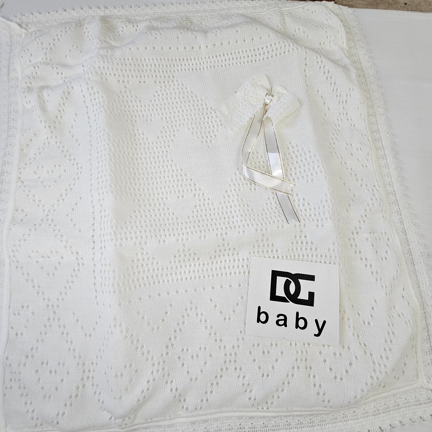 copertina fiocco in lana