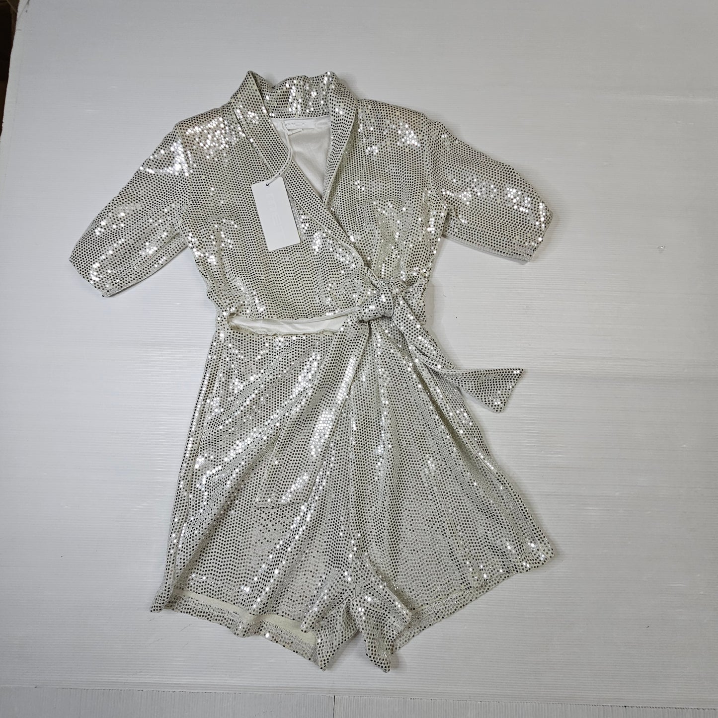 Tutina bimba MET ME205 oro effetto paillettes con cintura