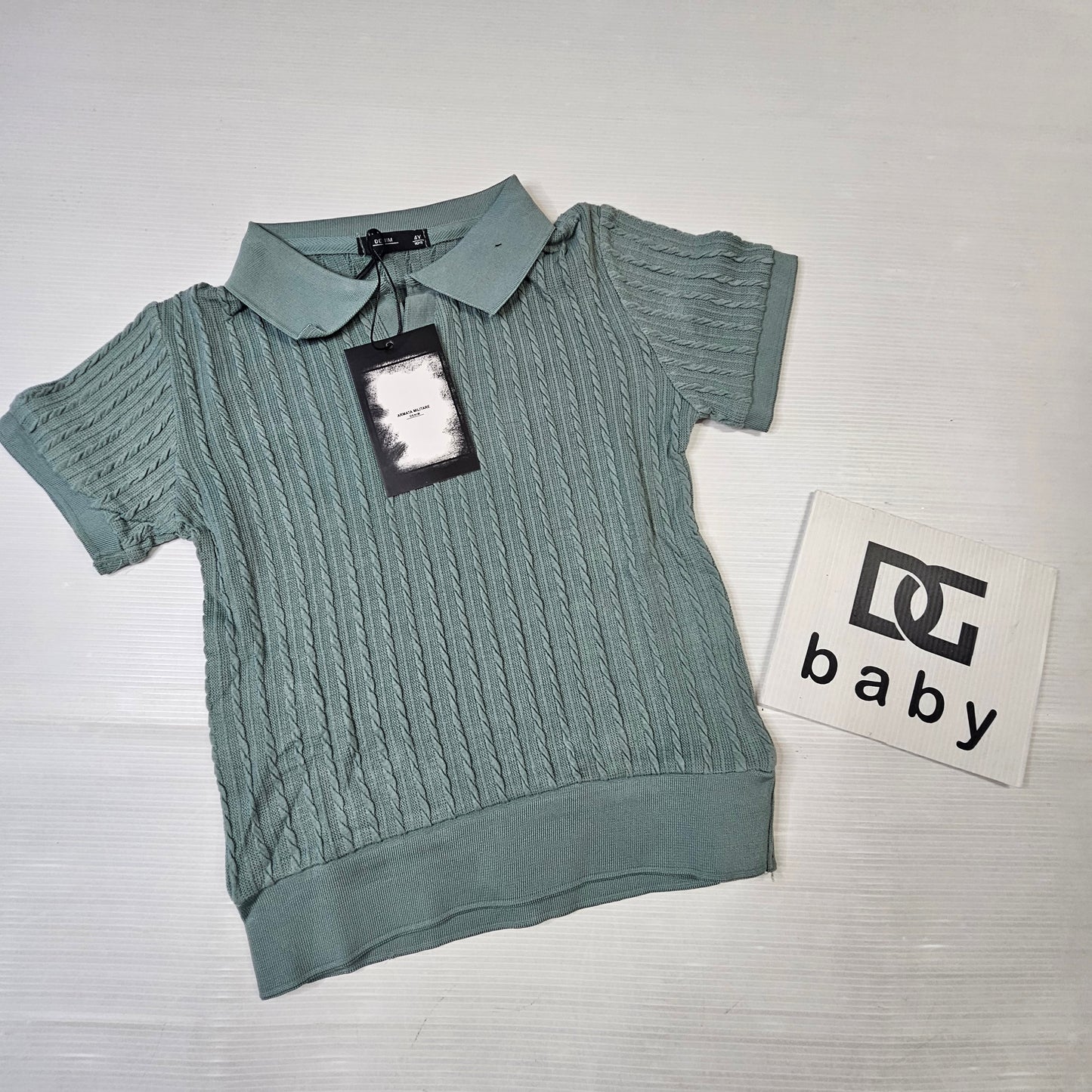 Polo bambino lavorata a rilievo
