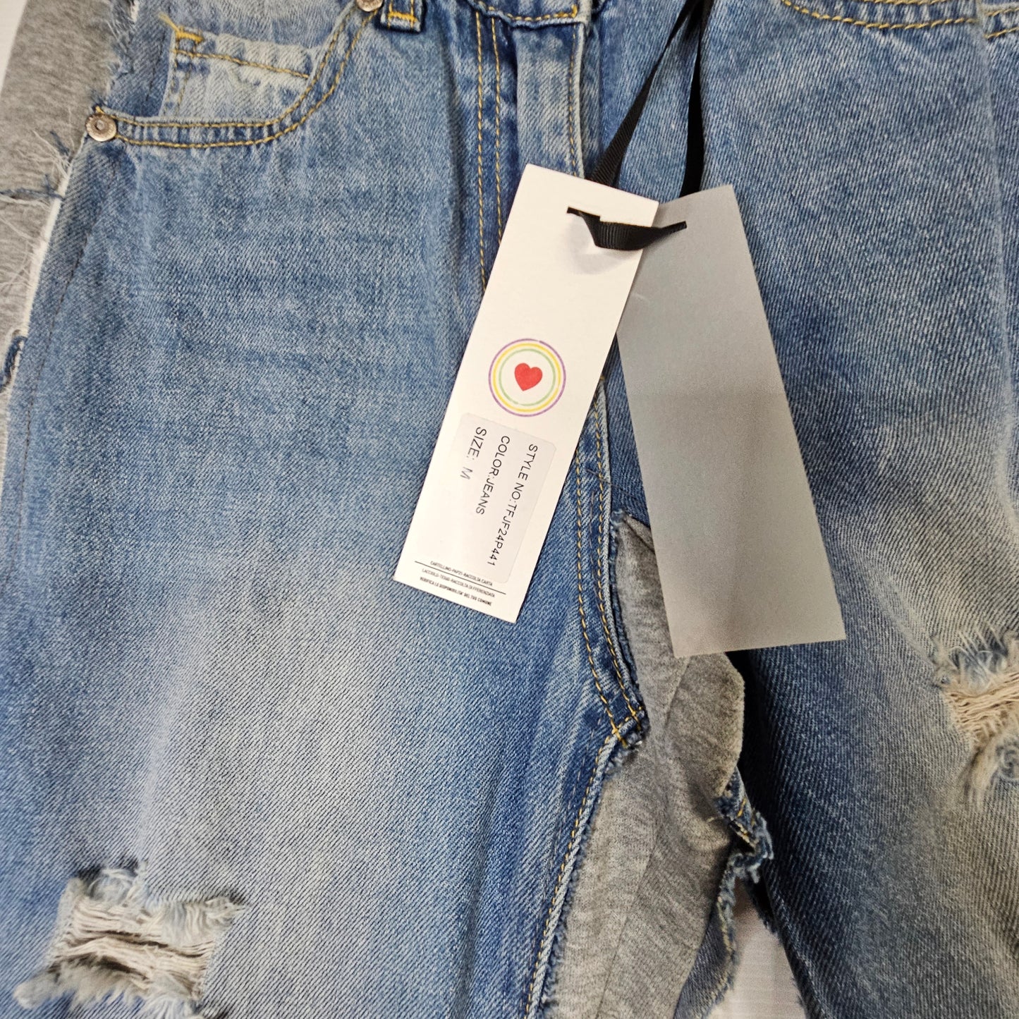 Jeans  con inserti felpa grigia e strappi – TOBETOO