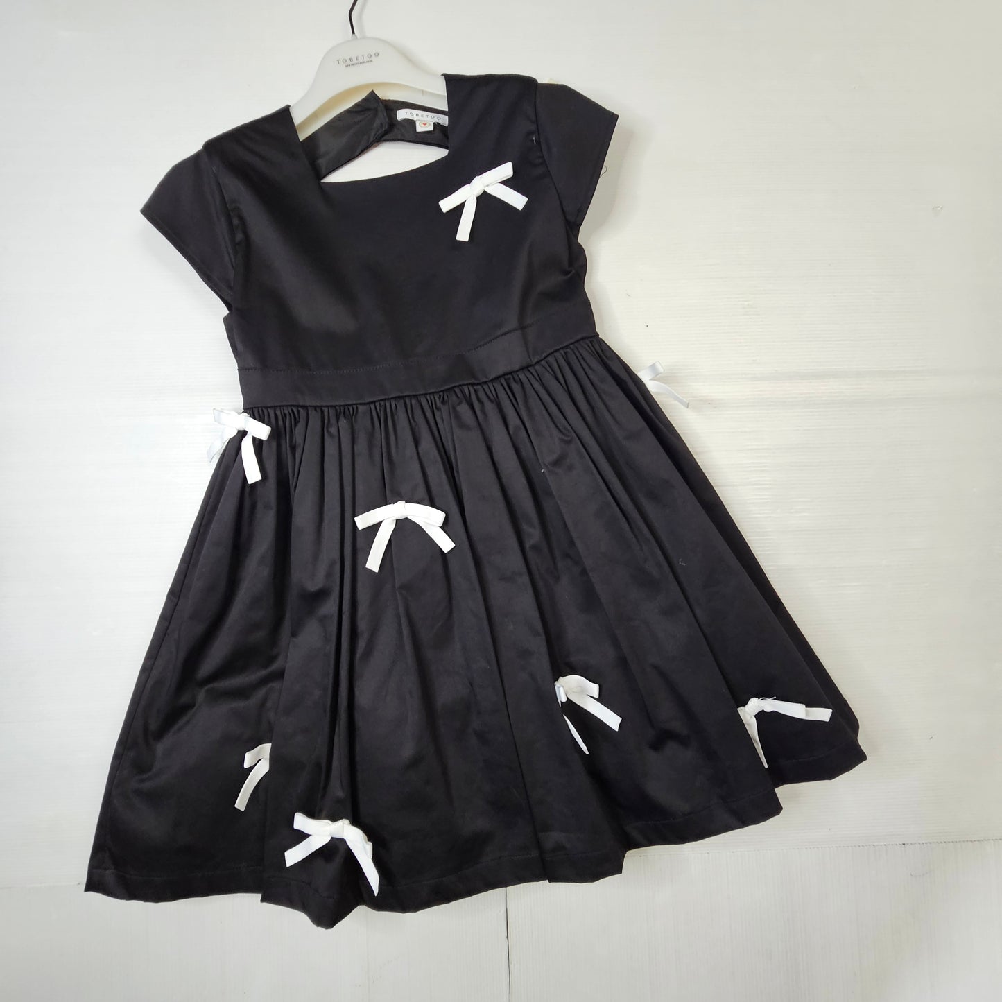 Vestito nero con fiocchi bambina 305ATBS25